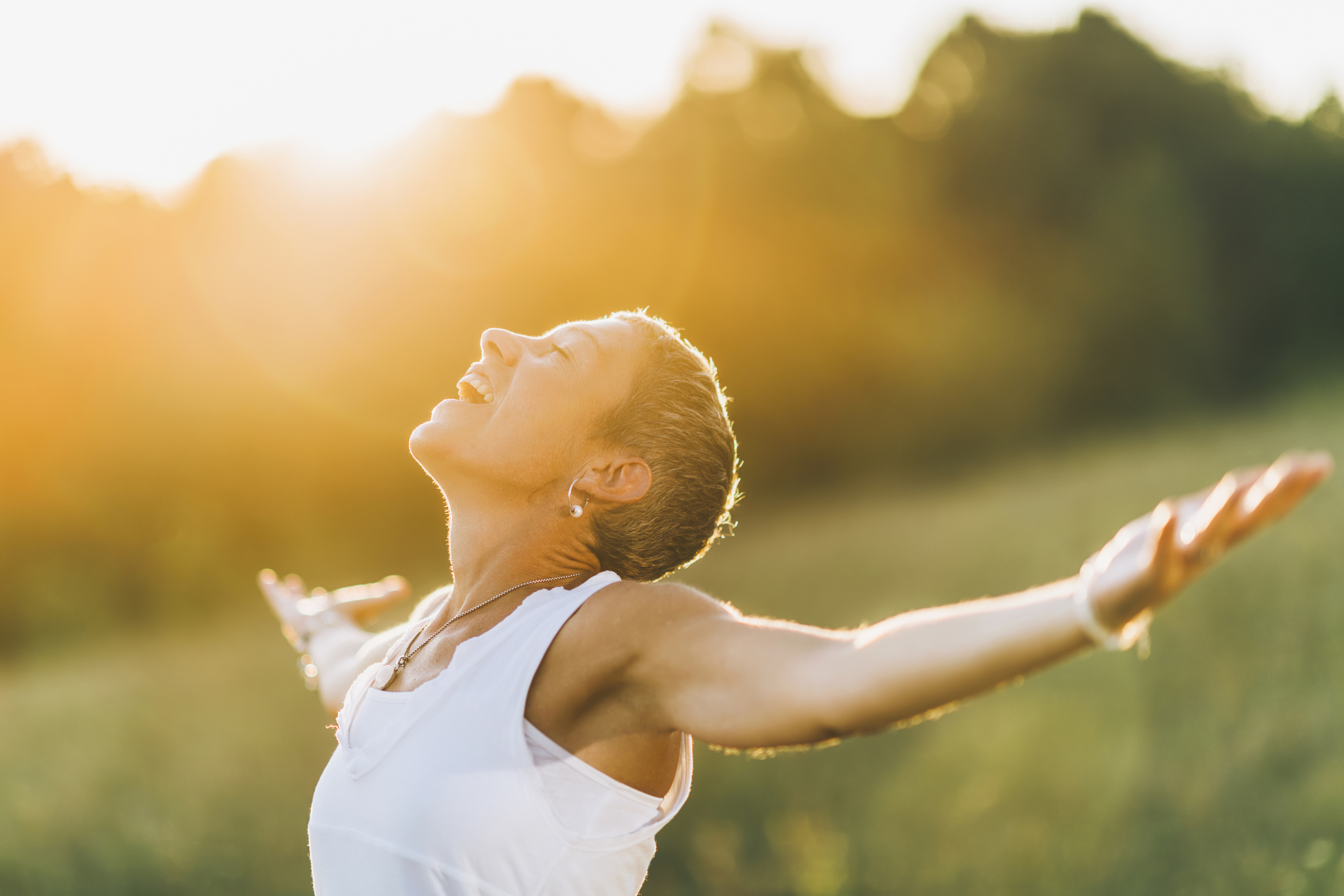Enlightenment, A Mindful Woman With Open Arms, Nurturing Positive Spiritual Energy destress strategies
